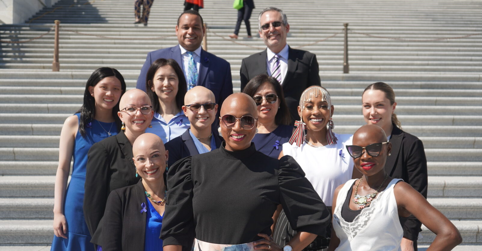 alopecia areata advocates standing on the steps with government officials
Become part of the NAAF legislative liaison program