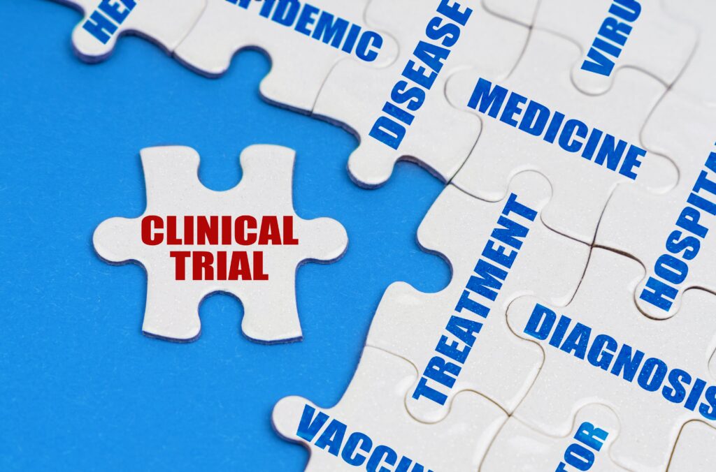 Puzzle pieces with medical terms like clincal trial